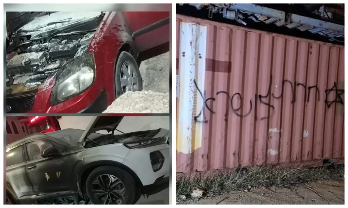 مستعمرون يحرقون مركبتين ويخطون شعارات عنصرية بالطيبة شرق رام الله